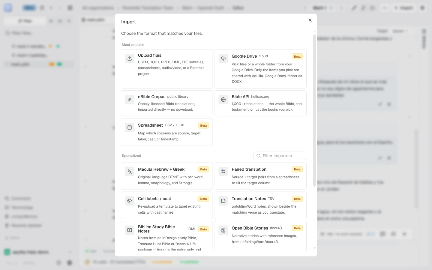 The Import dialog: Most popular options (Upload files, Google Drive, eBible Corpus, Bible API, and Spreadsheet) above a Specialized section with importers such as Macula Hebrew and Greek, Paired translation, Cell labels / cast, Translation Notes, Biblica Study Bible Notes, and Open Bible Stories
