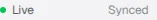The sync status indicator in the workspace footer showing Live and Synced