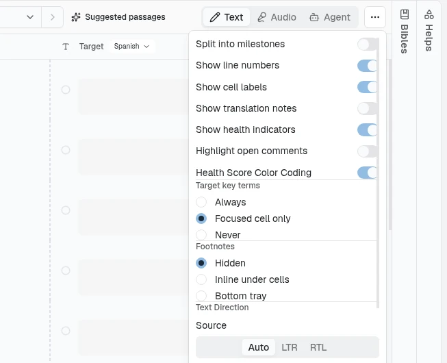 The Editor settings menu open from the editor toolbar's ⋯ button, with switches for Split into milestones, Show line numbers, Show cell labels, Show translation notes, Show health indicators, Highlight open comments, and Health Score Color Coding (on); Target key terms options Always, Focused cell only, and Never; Footnotes options Hidden, Inline under cells, and Bottom tray; and the source Text Direction choice of Auto, LTR, or RTL
